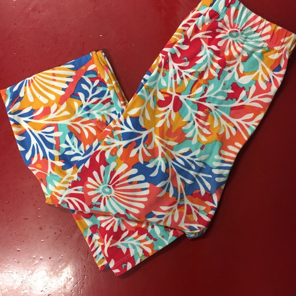 Girls Lularoe floral print leggings.